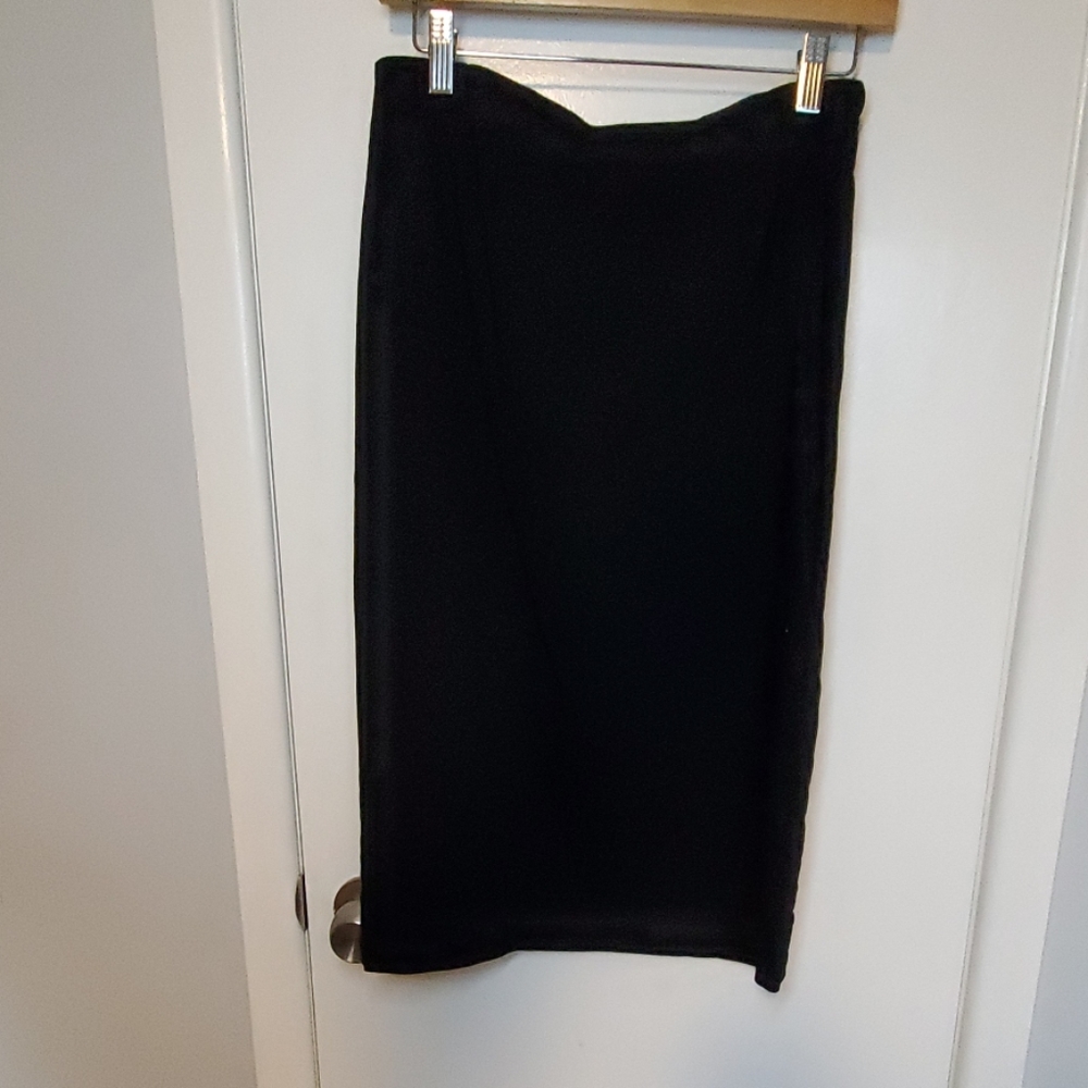 Black pencil skirt with side buttons detail